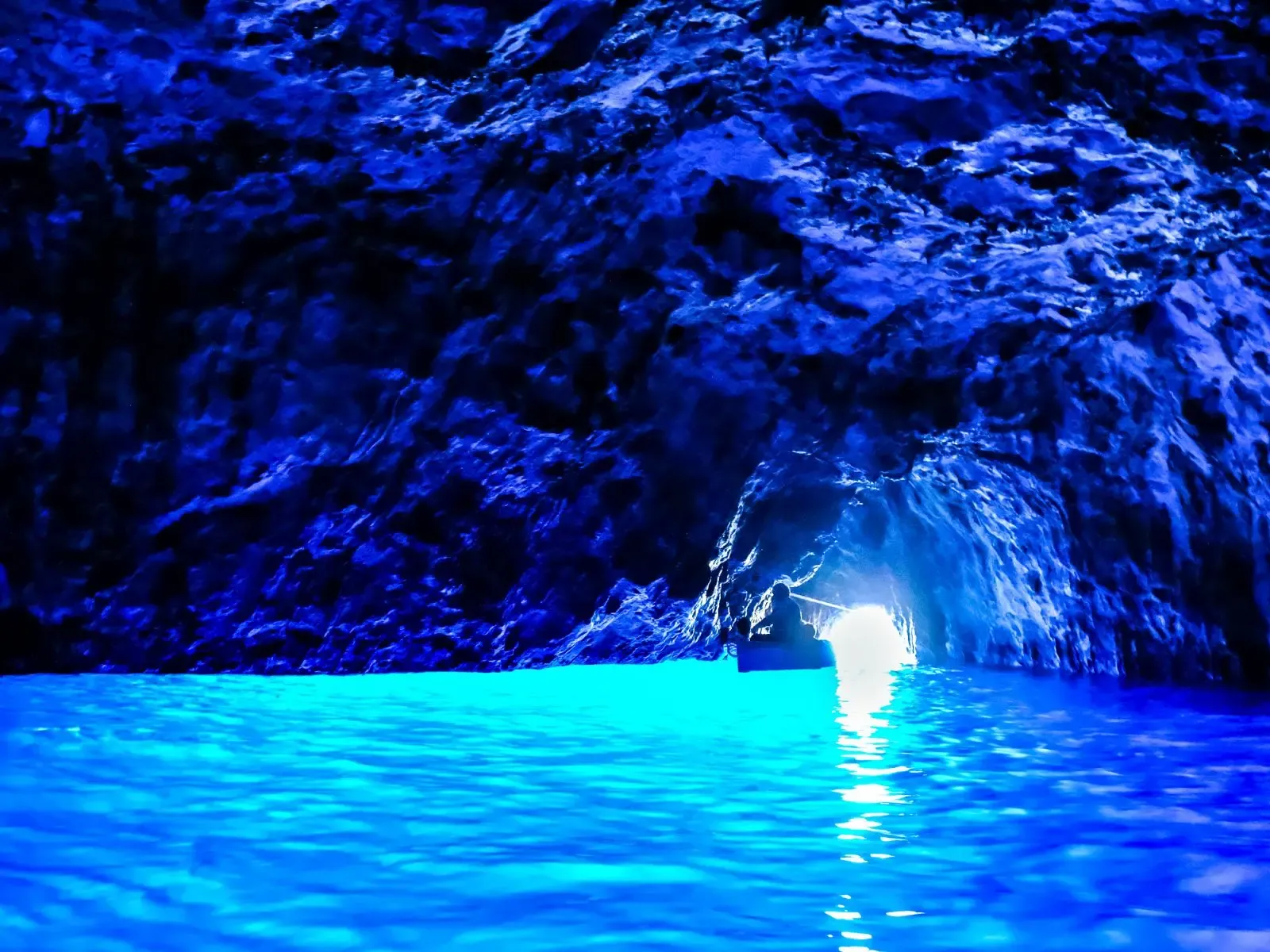Glowing blue water inside the Blue Cave on Biševo island near Split, Croatia